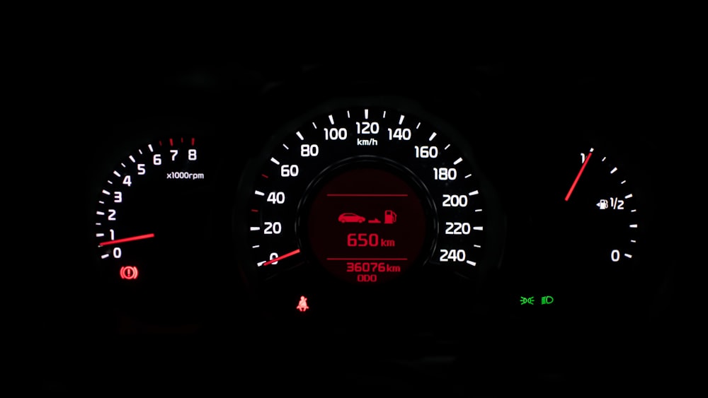 Illuminated instrument cluster showing performance-focused readouts